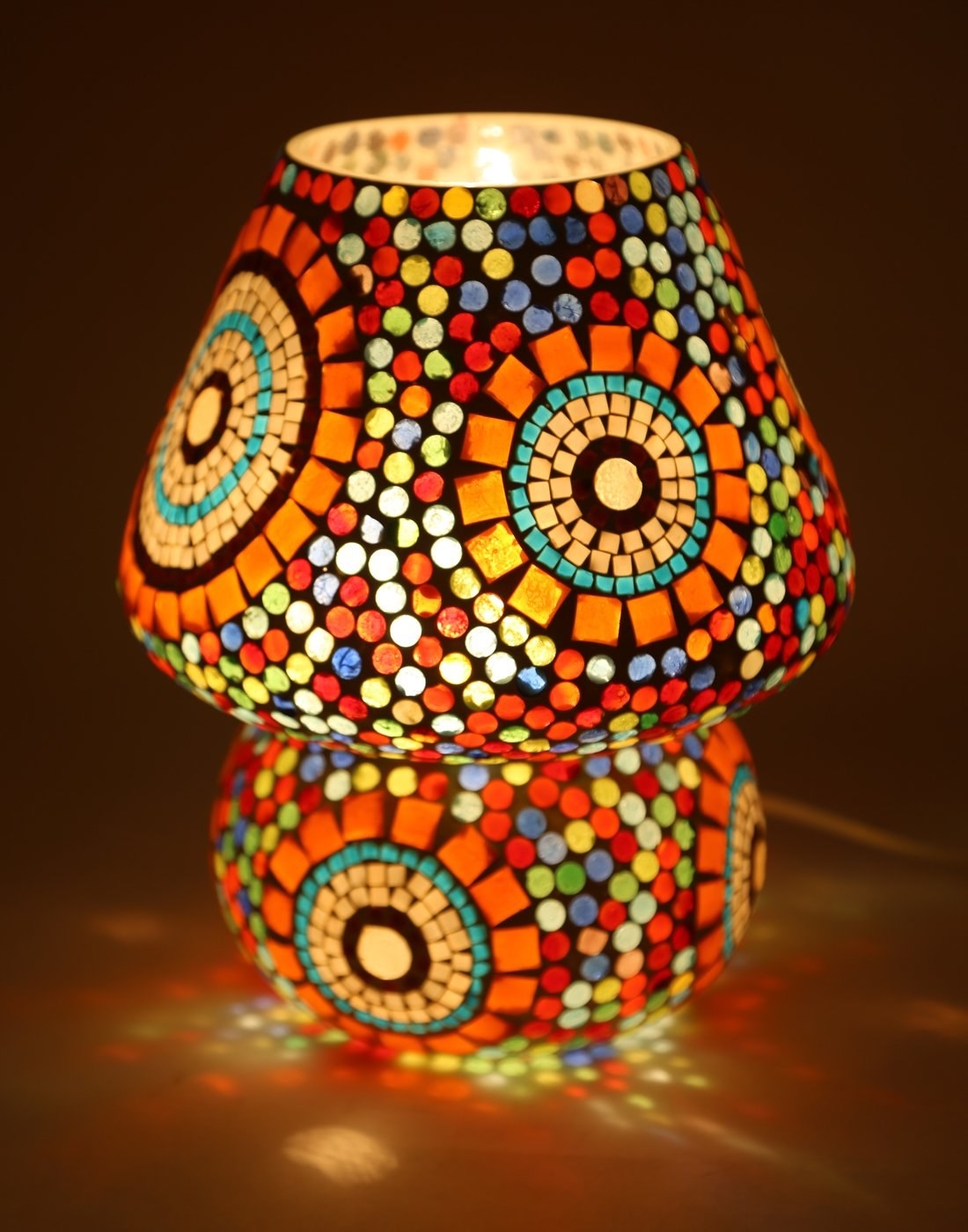 A mosaic lamp on a table