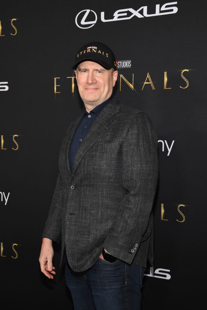 Kevin Feige, in an Eternals cap, on the Eternals red carpet