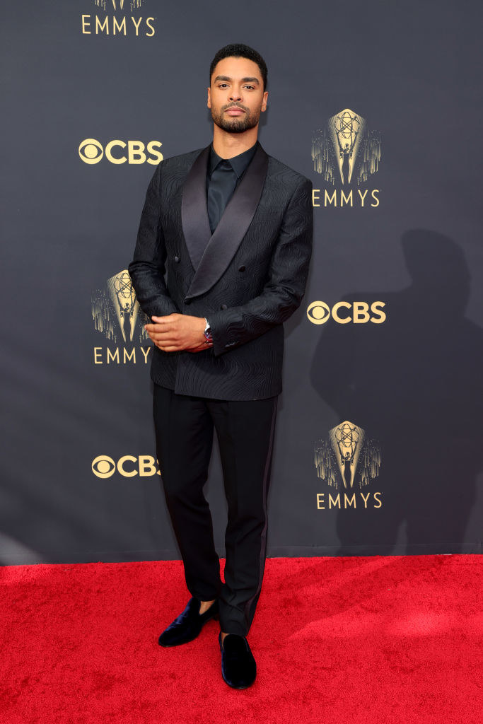 Regé-Jean Page poses in a suit at the 2021 Emmys