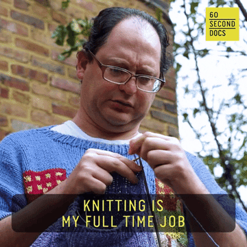 A man is seen knitting