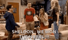 Penny, Leonard, Sheldon and Amy and hugging each other excitedly.