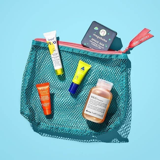 a birchbox bag with five different makeup and skincare samples