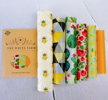Six rolls of beeswax food wraps in different sizes and patterns