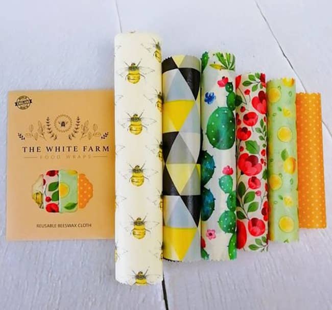 Six rolls of beeswax food wraps in different sizes and patterns