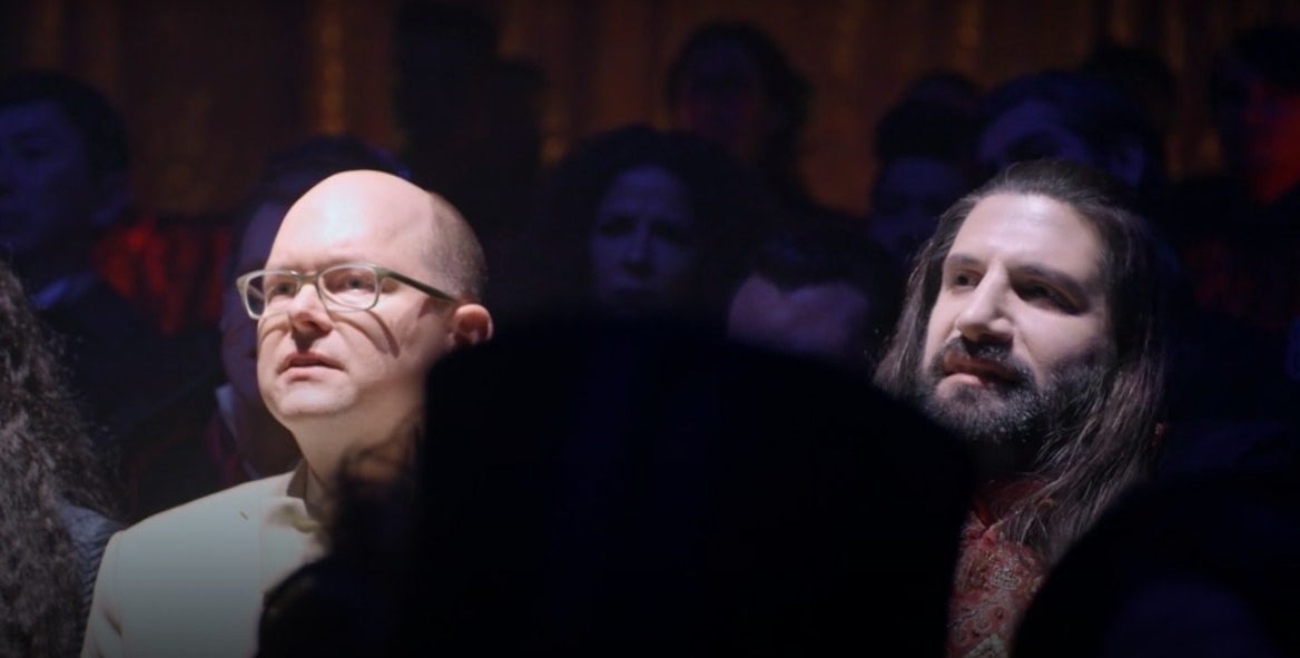 Colin Robinson and Nandor looking up at the theatre in &quot;What We Do in the Shadows&quot;