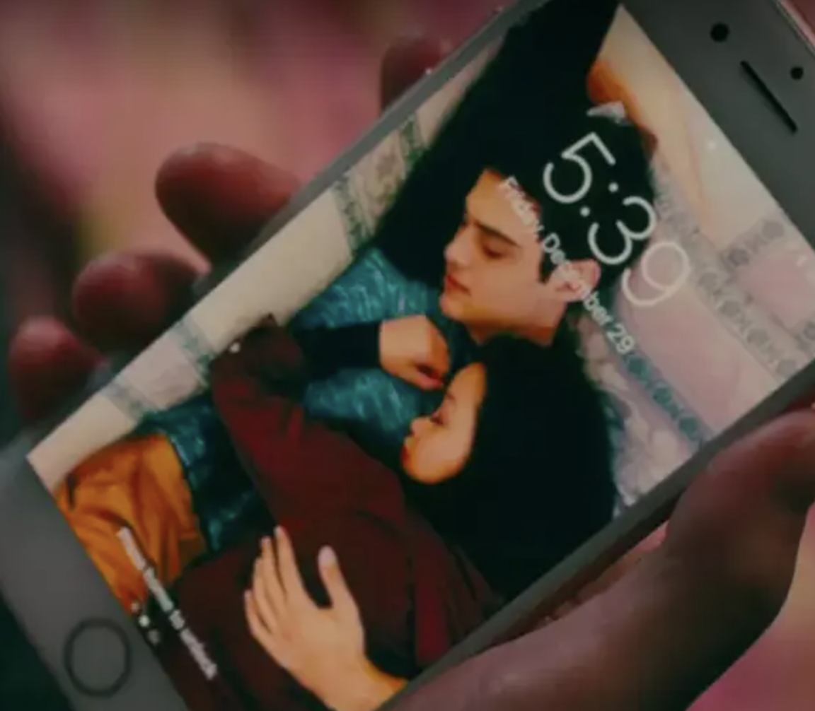 Lara Jean&#x27;s lock screen of her and Peter cuddling