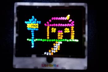 Reviewer's photo showing their child's design on the lit up board