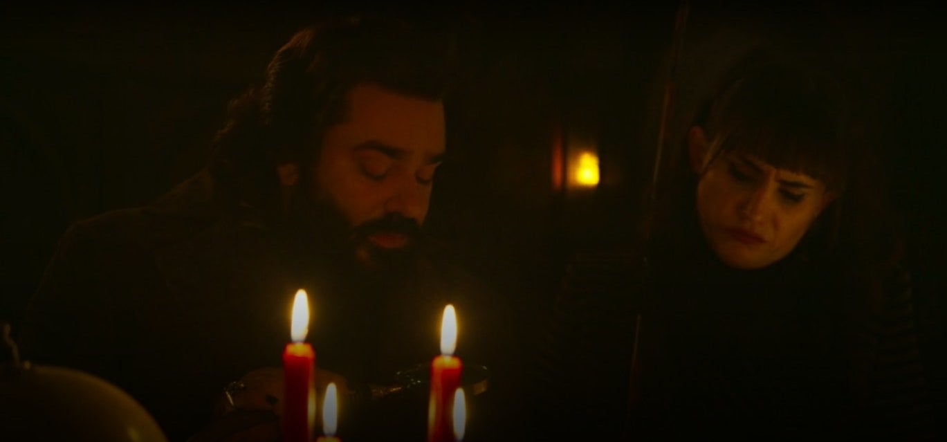 Nadja and Laszlo looking down at a map in &quot;What We Do in the Shadows&quot;