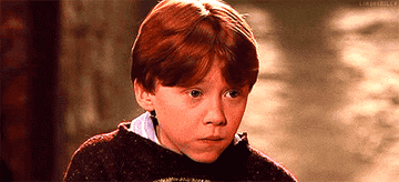 Ron shrugging