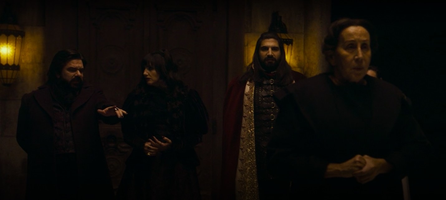 Nandor, Laszlo, Nadja, and the Baron&#x27;s familiar at the Vampire Council in &quot;What We Do in the Shadows&quot;