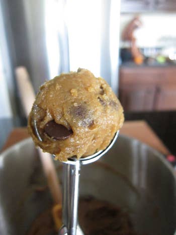 Reviewer photo of the cookie scoop filled with chocolate chip cookie dough