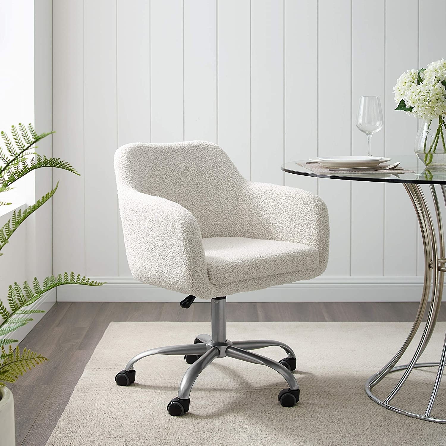 sherpa office chair with a rolling base styled next to a table