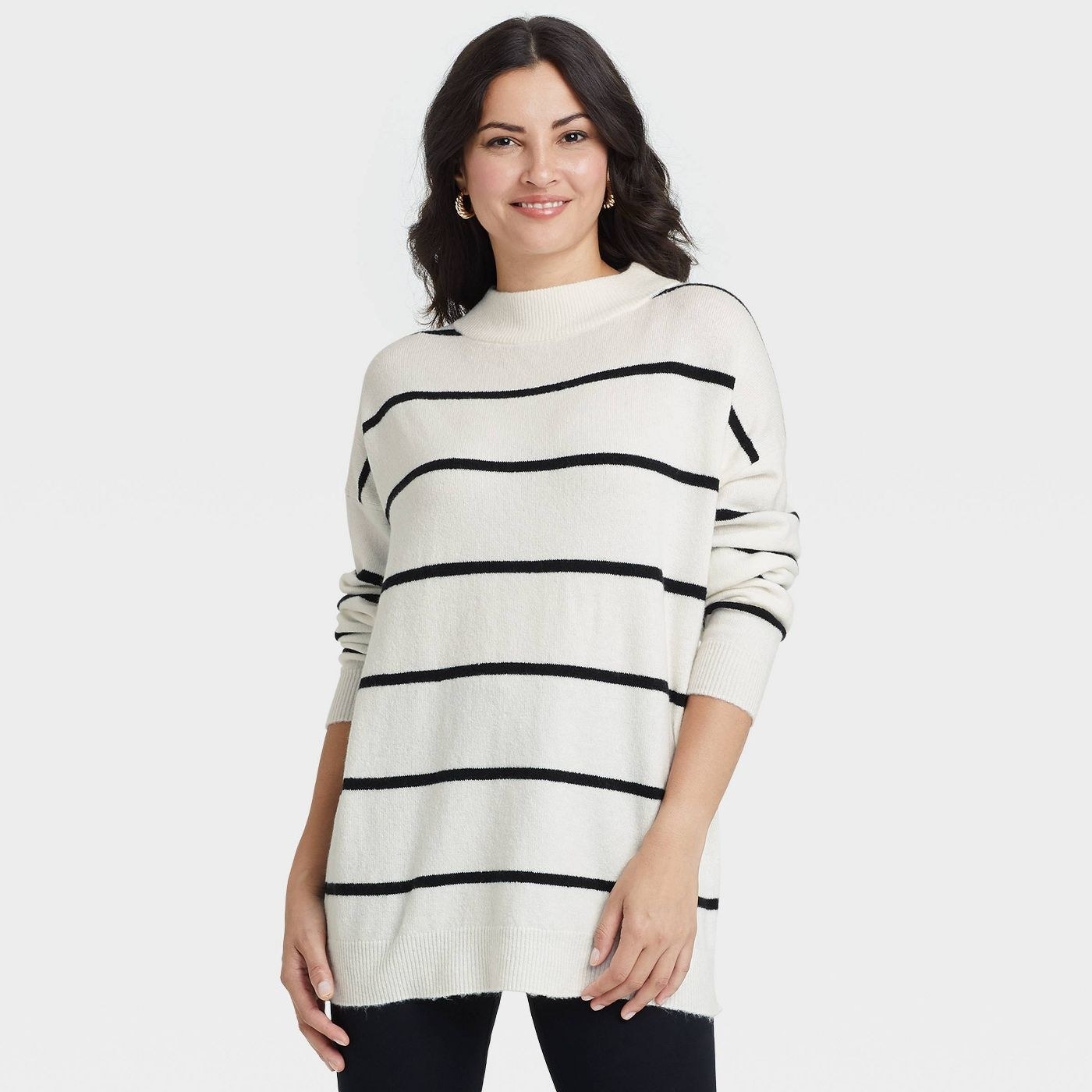 A black and white striped mock turtle neck