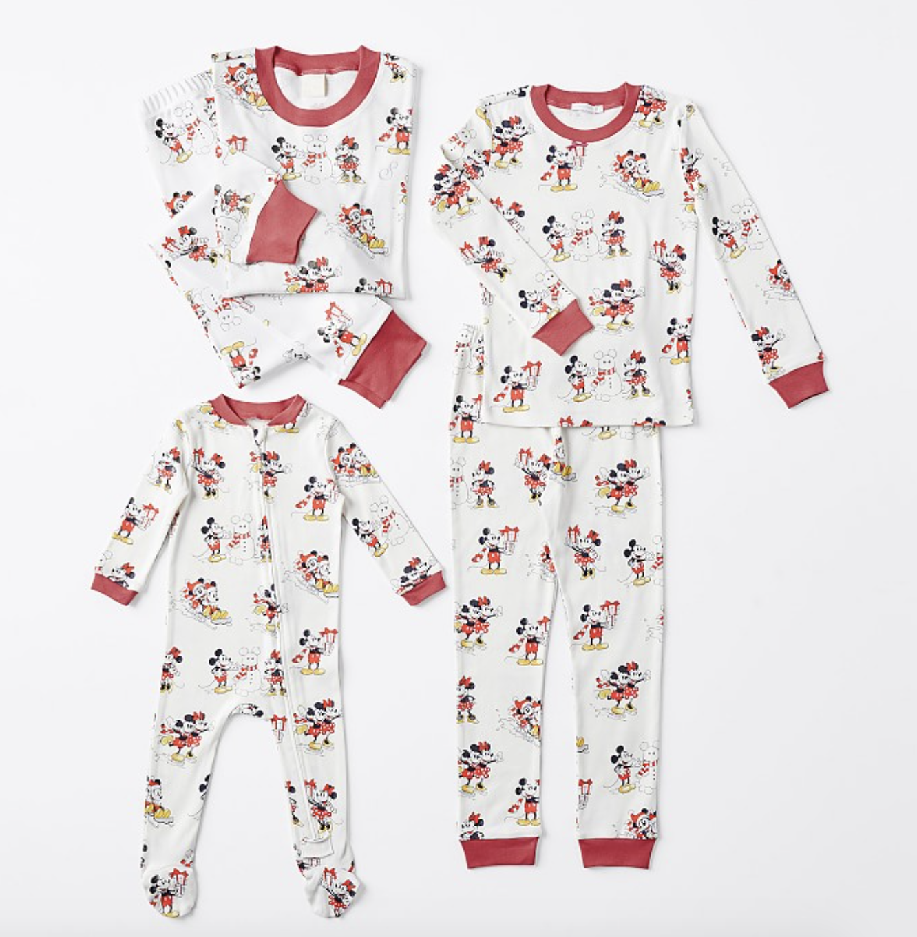 three different sizes of mickey and minnie holiday pajamas