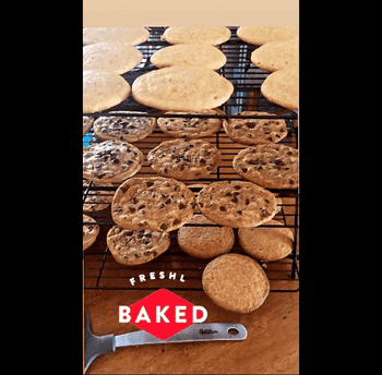 Reviewer GIF of cookies cooling on the rack with text: 
