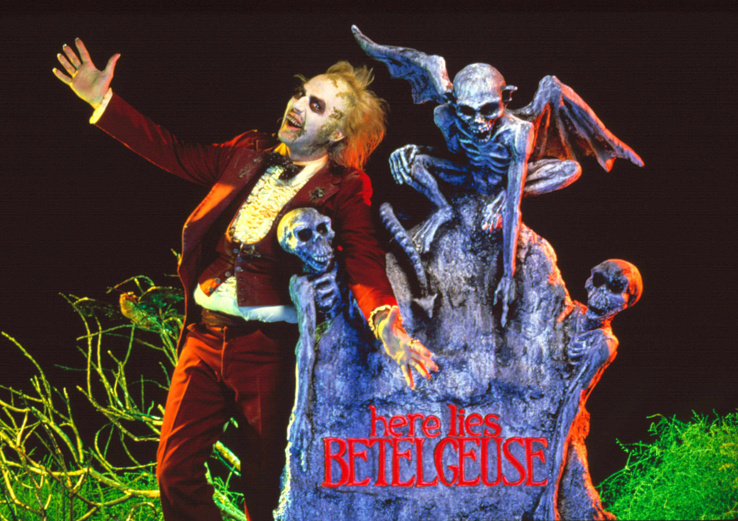 promo shot for film with Beetlejuice at his grave