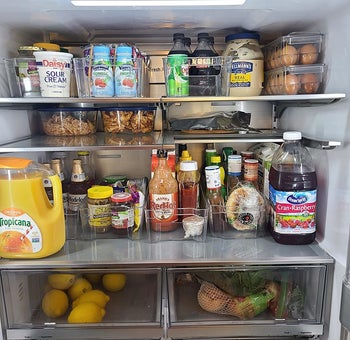 same fridge with organized groceries
