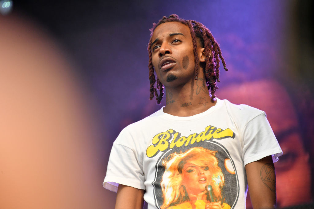 Playboi Carti onstage wearing a Blondie shirt