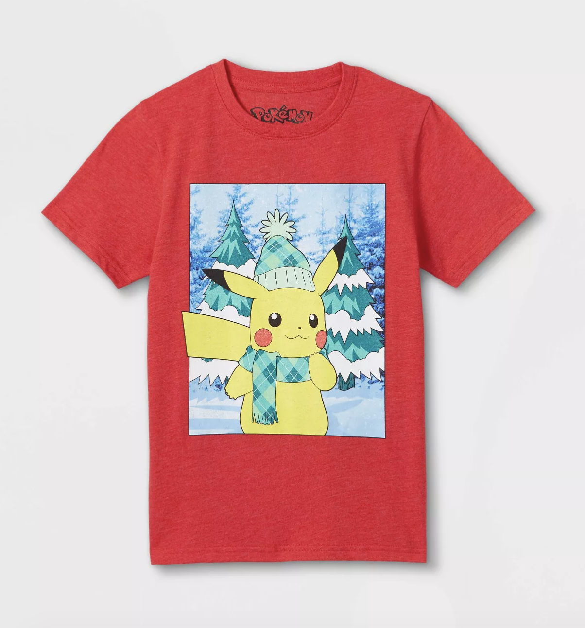 a red tee with an image of pikachu in a snowy forest wearing a hat and scarf