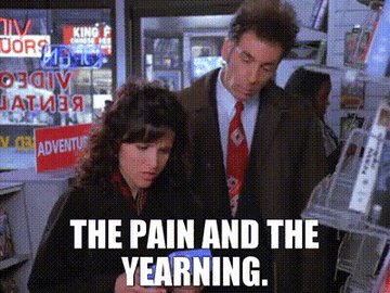GIF from &quot;Seinfeld&quot; featuring Elaine and Kramer with the caption &quot;The pain and the yearning&quot; in all caps