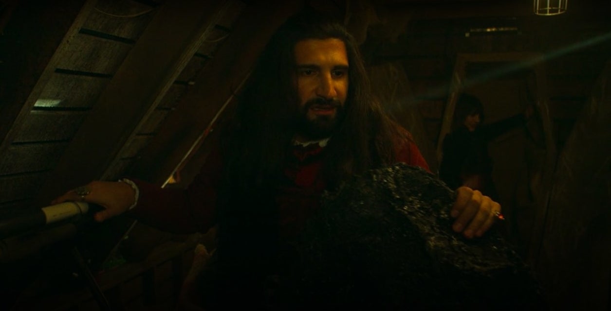 Nandor, high on drug blood, holding on to the Stairmaster, in &quot;What We Do in the Shadows&quot;