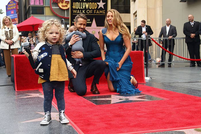 Blake Lively and Ryan Reynolds with their children attend a ceremony honoring Ryan with Star on the Hollywood Walk Of Fame