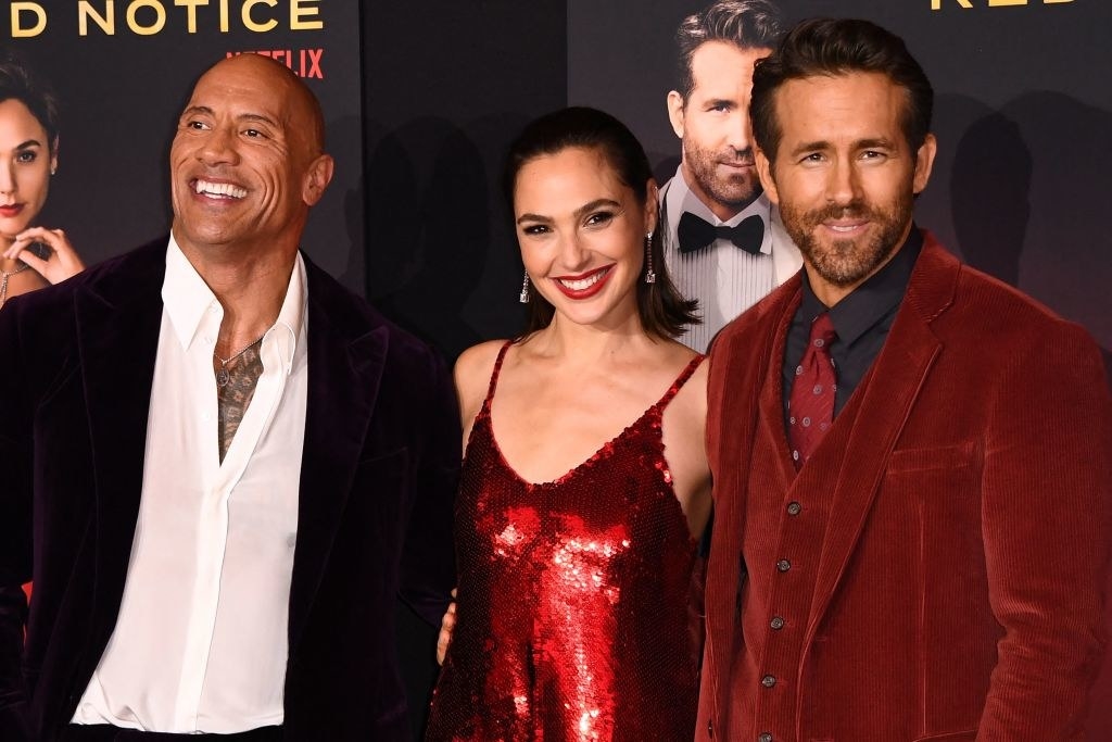 Dwayne Johnson (L), Gal Gadot (C) and Ryan Reynolds attend the world premiere of Netflix&#x27;s &quot;Red Notice&quot;