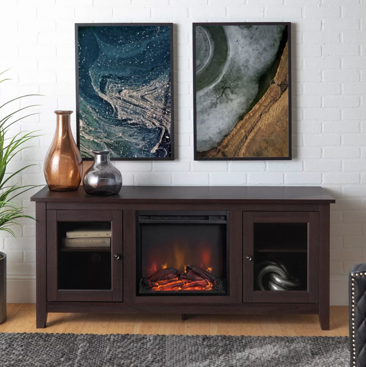 an electric fireplace in a piece of furniture