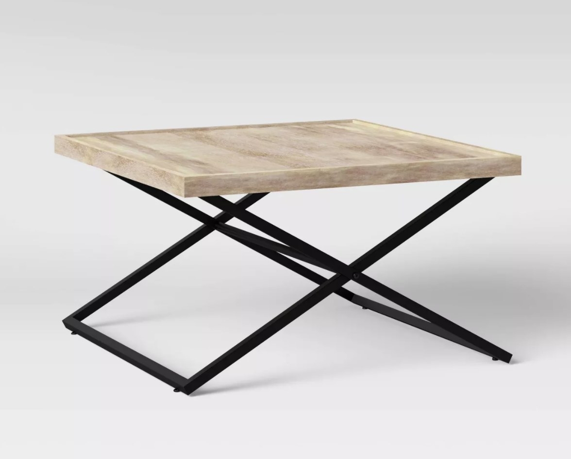 Simple wooden coffee table with X legs