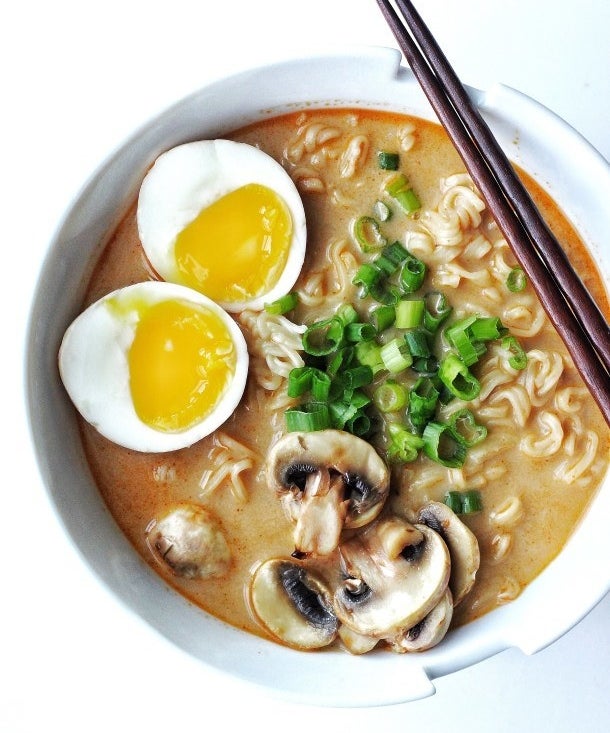 Creamy miso ramen in a white bowl with chopsticks