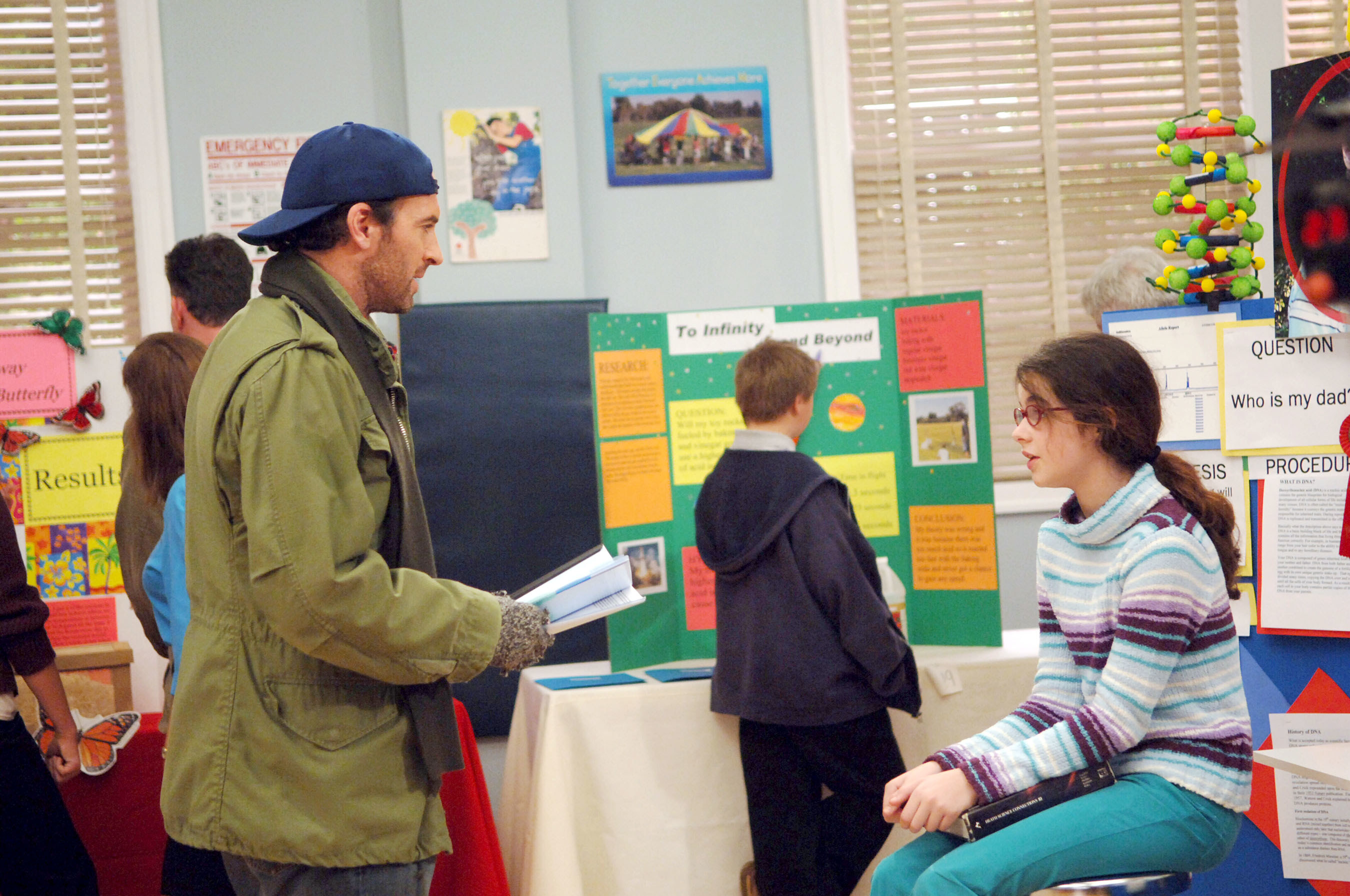 Luke meets April for the first time at the science fair