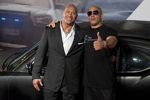 Dwayne Johnson (The Rock) and Vin Diesel (R) pose for photographers during the premiere of the movie "Fast and Furious 5"