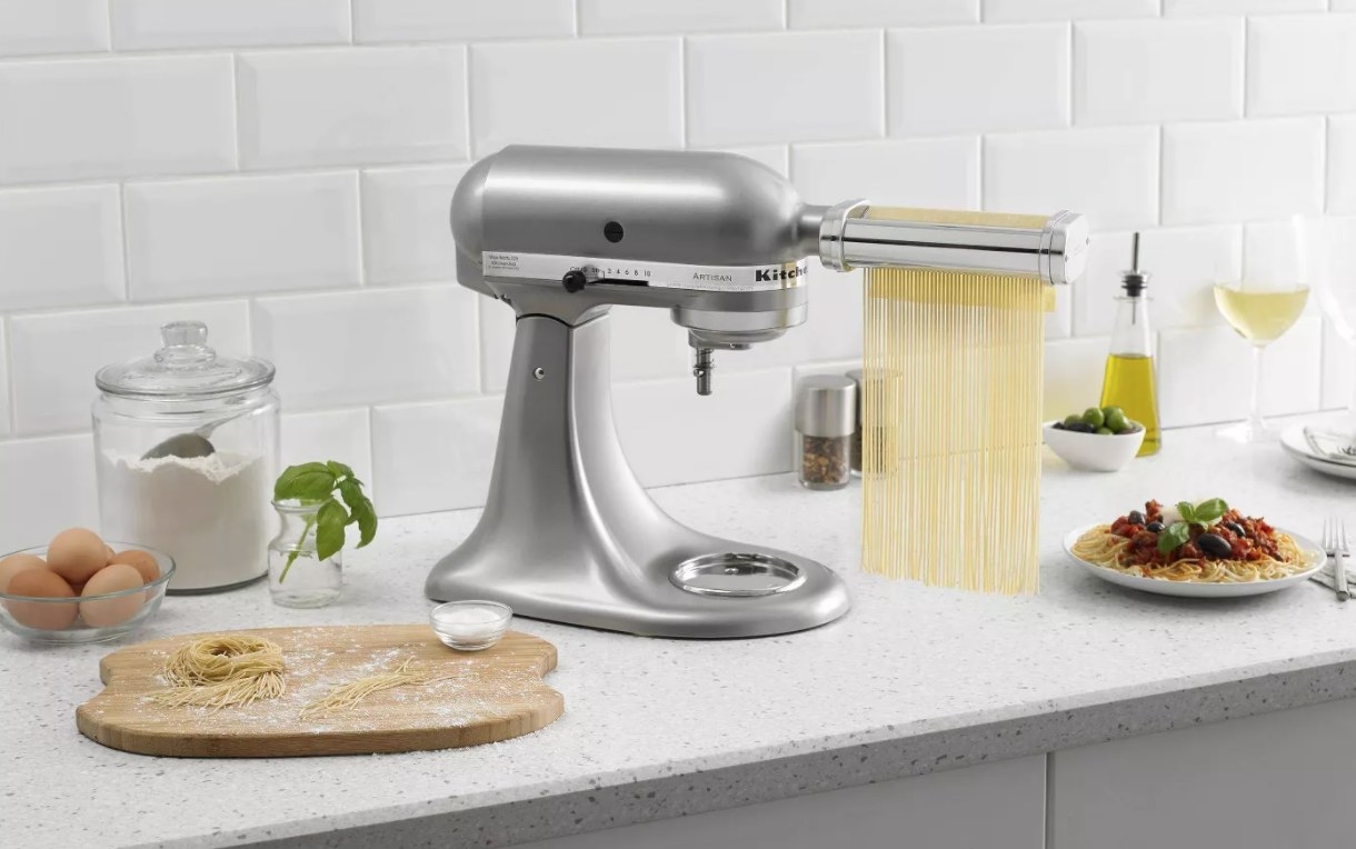 KitchenAid stand mixer with pasta maker, with pasta rolling through