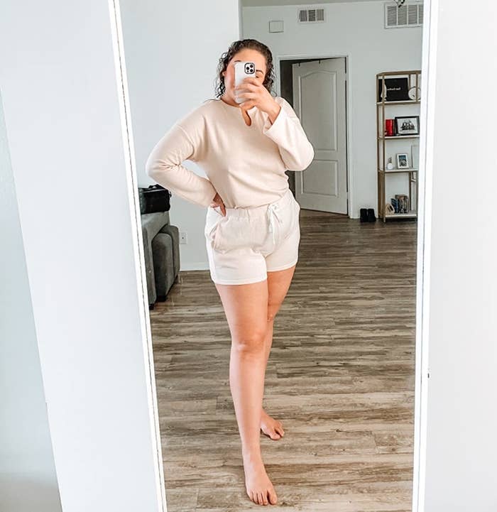 Reviewer is wearing the short and long sleeve top set in a cream color