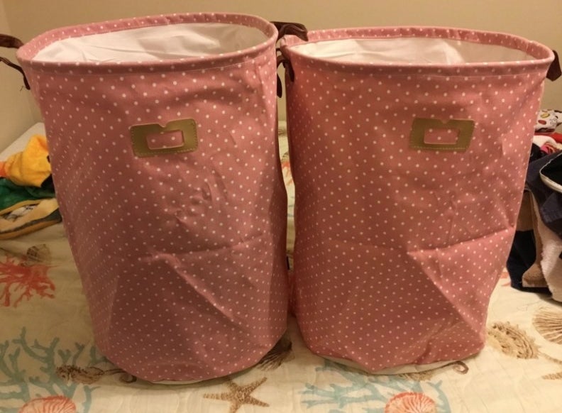 Two pink polka-dotted hampers on a reviewer&#x27;s bed