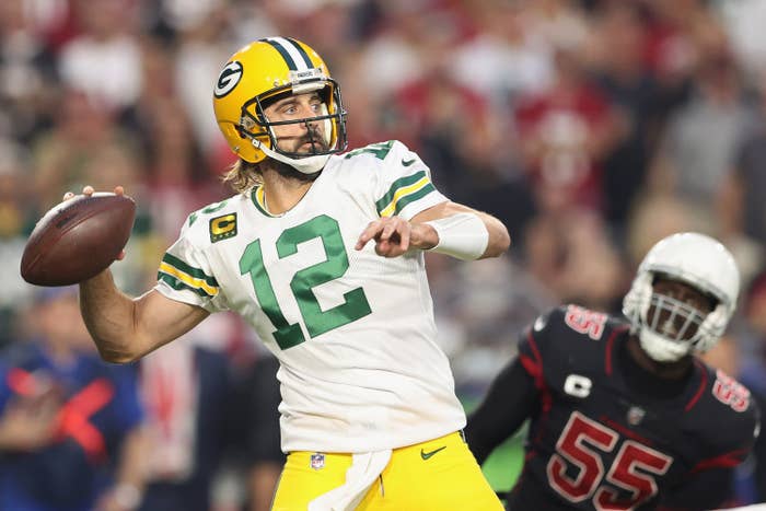 Aaron throwing a football during a game