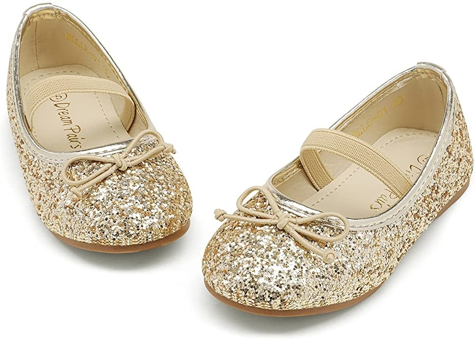 sparkle covered gold flat shoes