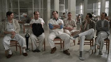 the patients sitting in a circle in One Flew Over the Cuckoo&#x27;s Nest