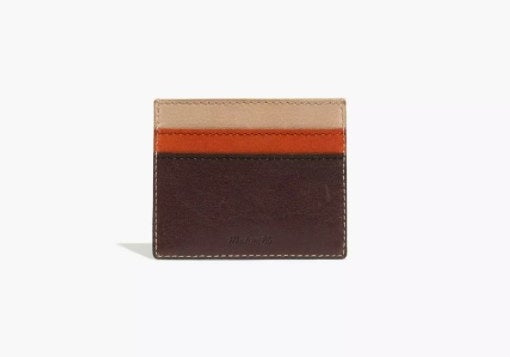 the card case with dark brown bottom, orange middle, and tan top
