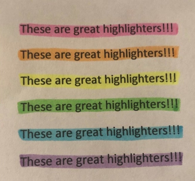 Rainbow highlighters being used over black text from a reviewer