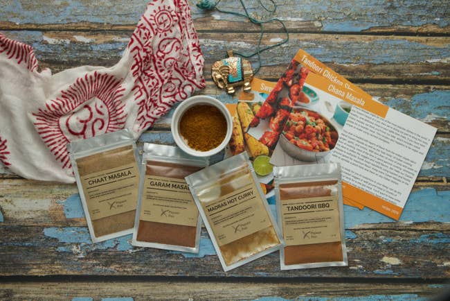 spice packets laid out along with recipe cards