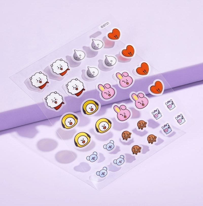 a sheet of pimple patches, all in the shape of the bt21 characters