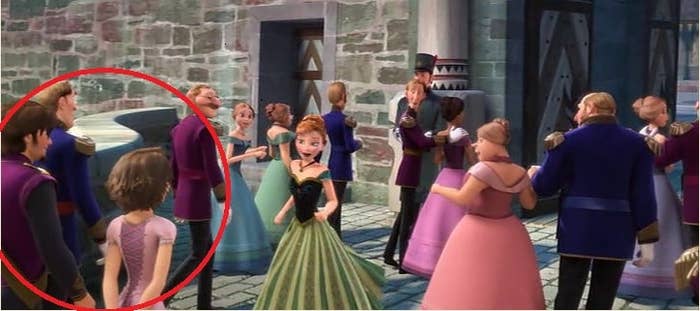the back of rapunzel and flynn in elsa and anna's castle in arendelle