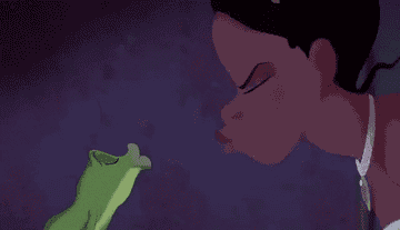 Tiana kissing Frog Naveen with her eyes squeezed shut