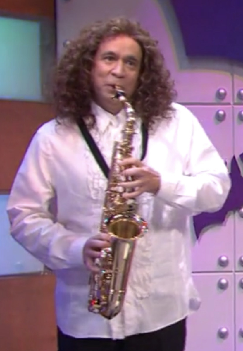 Armisen making a cameo, playing the saxophone in 2021