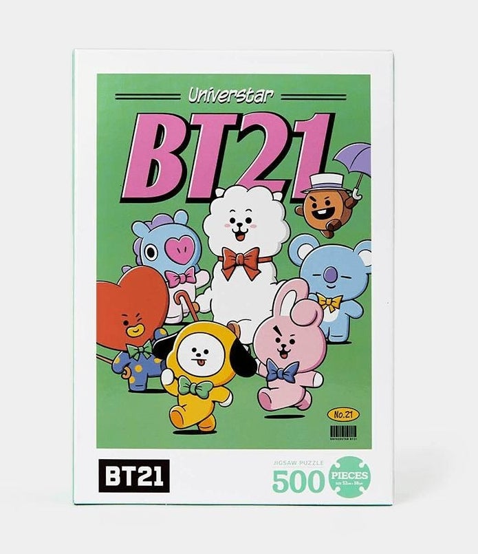 the cover of the 500 piece bt21 puzzle stylized like a vintage poster