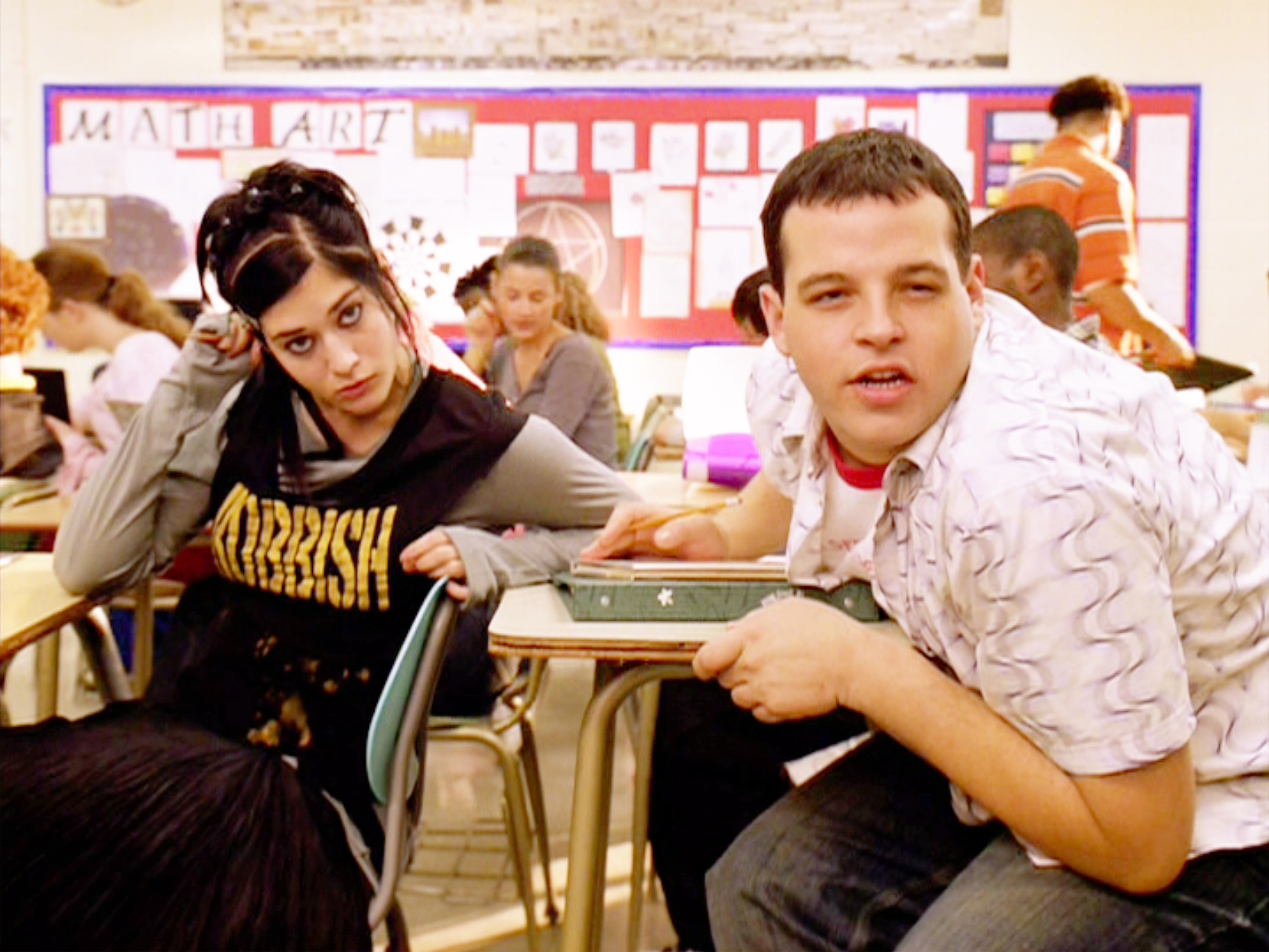 damian in mean girls in a classroom