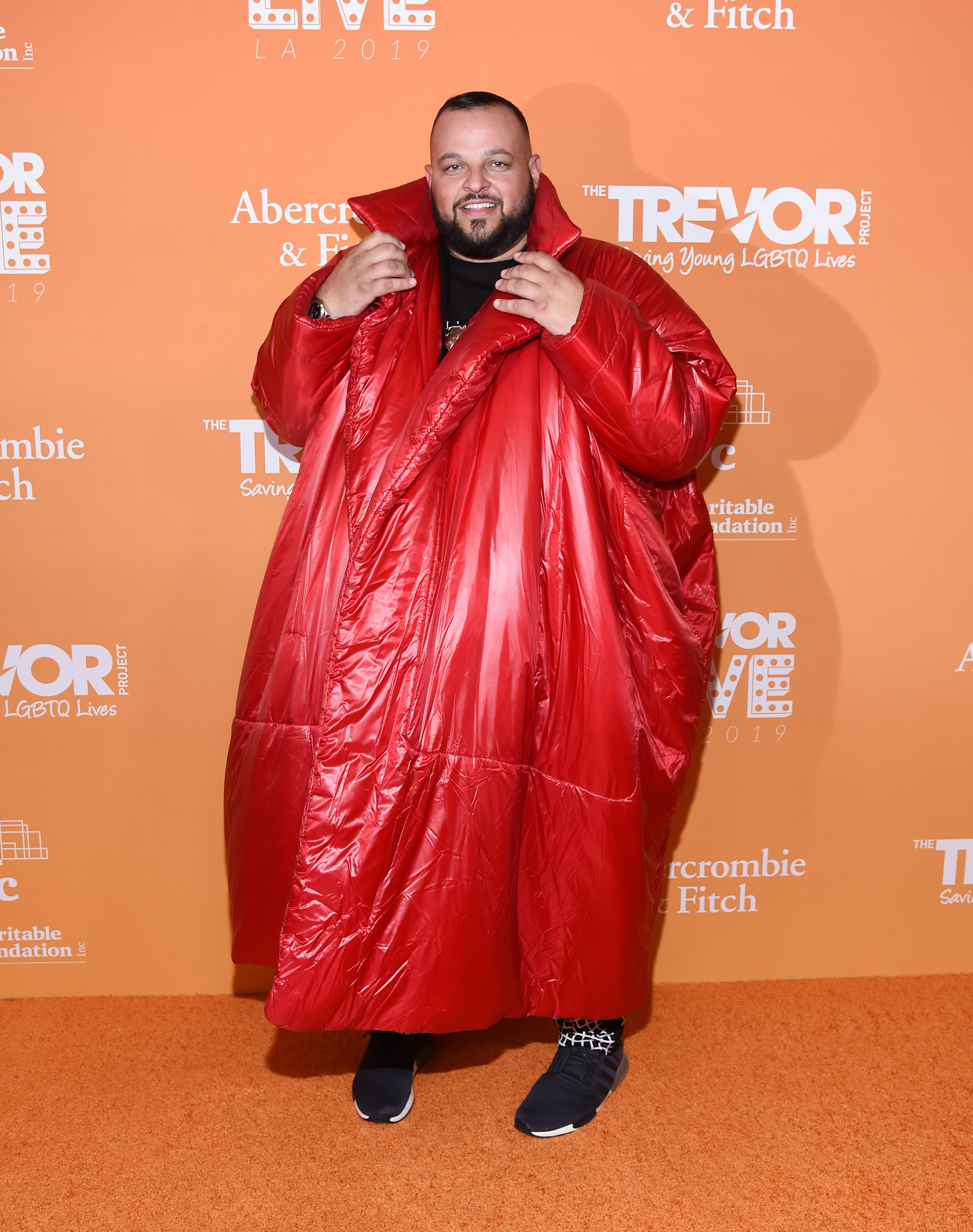 in a giant red jacket