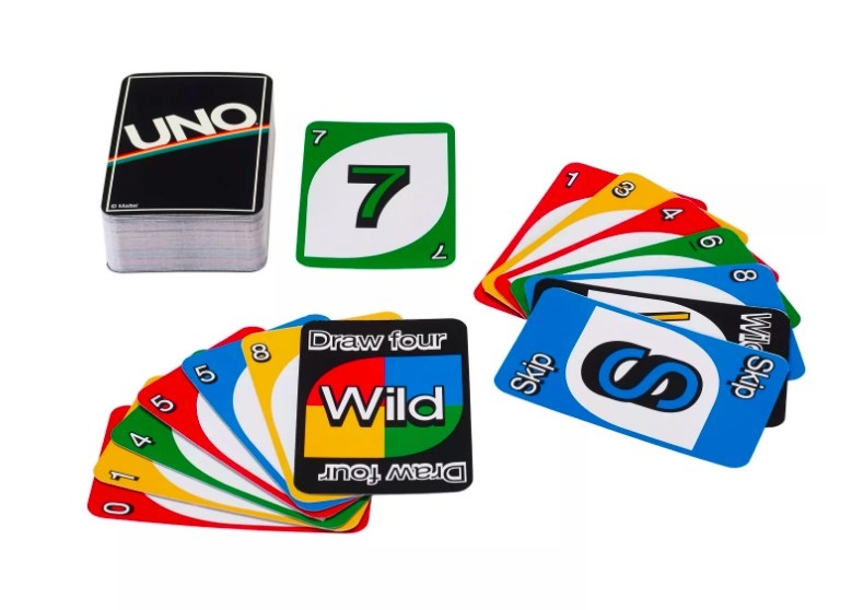 The Uno card game spread out in play