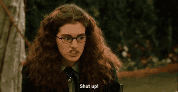 Character Mia Thermopolis sits outside and says &quot;Shut up!&quot;